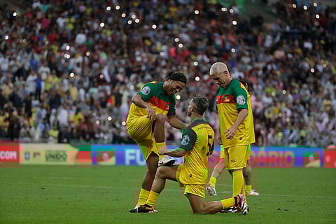 Ronaldinho Gaucho celebrates scoring a goal